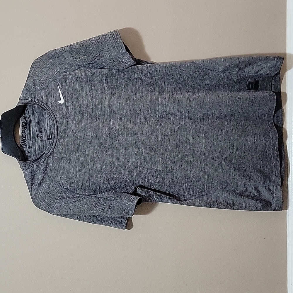 NIKE womens dri fit pro top